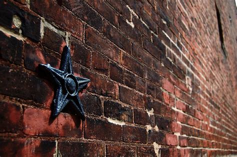 metal star for exterior of house meaning|cast iron stars on buildings.